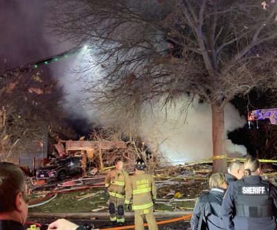 Firefighter killed, 13 injured in Virginia home explosion