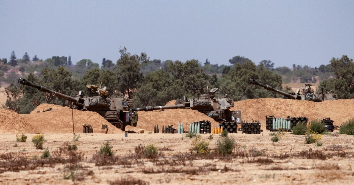 Israel shells Rafah as Biden vows arms suspension